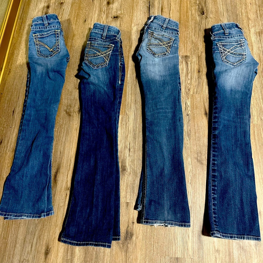 4 pair ariat jeans
